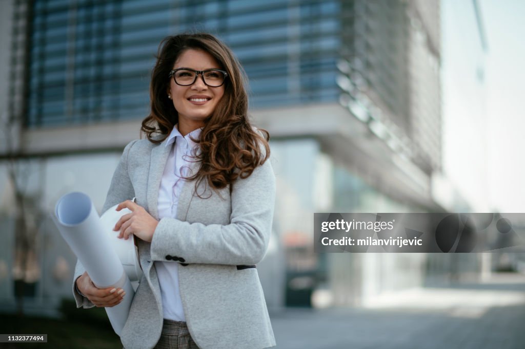 Businesswoman, Architect, Blueprint, Engineer. Business woman with project