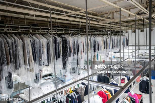 view of an industrial laundry service with no people - dry cleaning shop stock pictures, royalty-free photos & images