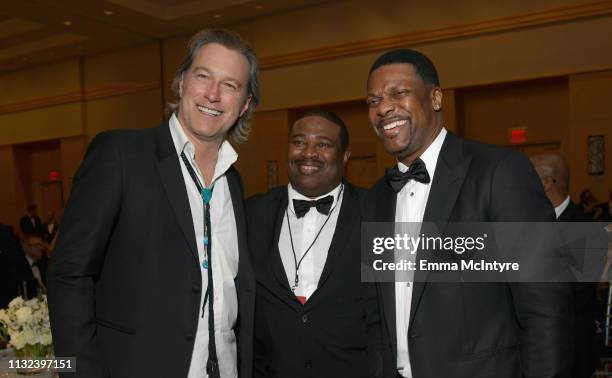 John Corbett, Darryl Jones, and Chris Tucker attend Celebrity Fight Night XXV on March 23, 2019 in Phoenix, Arizona.