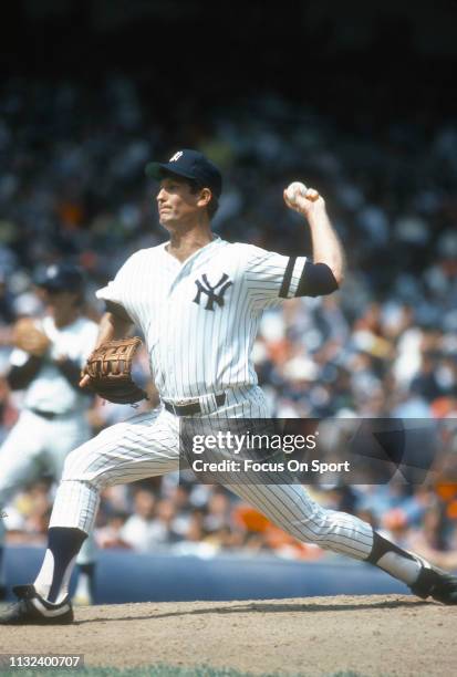 Tommy John of the New York Yankees pitches during a Major League Baseball game circa 1980 at Yankee Stadium in the Bronx borough of New York City....