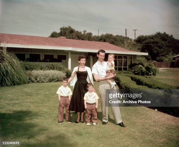 American television host and comedian Johnny Carson with his first wife Jody Wolcott and their sons Christopher, Richard and Cory at their home in...