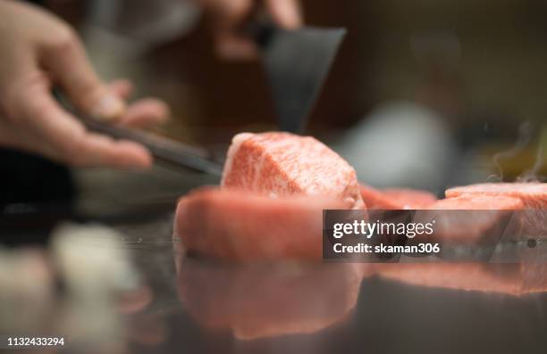 japanese wagyu beef kobe cooking teppanyaki - teppanyaki stock pictures, royalty-free photos & images