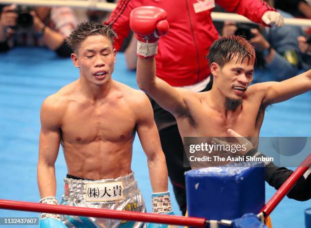 Champion Vic Saludar of the Philippines celebrates retaining his title after beating challenger Masataka Taniguchi of Japan in the WBO Minimumweight...