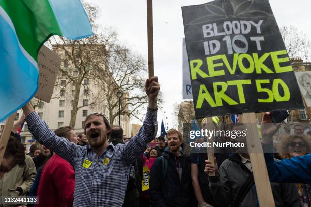 Protsters shout slogans outside Downing Street as over 1 million people take part in the anti-Brexit 'Put it to the People' march to demand a public...
