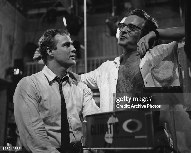 American actor Marlon Brando with director Sidney Lumet on the set of the 1960 film 'The Fugitive Kind'.
