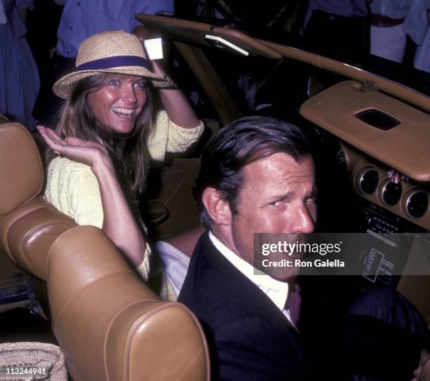 Cheryl Tiegs and Peter Beard attends Scenery-Greenery Celebrity Cocktail Party on July 31, 1982 at Montauk Manor in Montauk, New York.