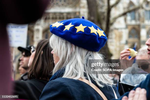 Woman seen with an EU beret during the protest. Over one million protesters gathered at the People's Rally in London demanding a second vote in the...