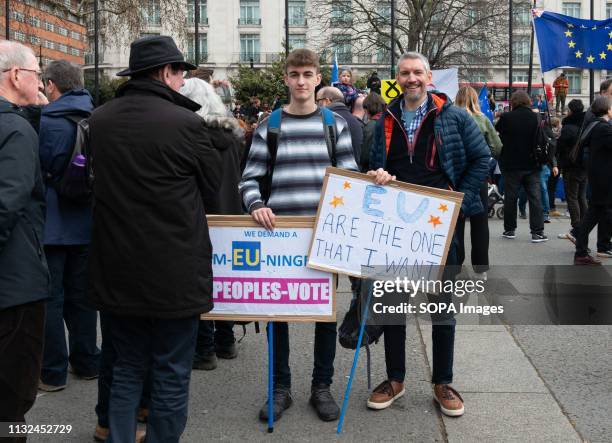 Demonstrator seen with placards during the protest. Over one million protesters gathered at the People's Rally in London demanding a second vote in...