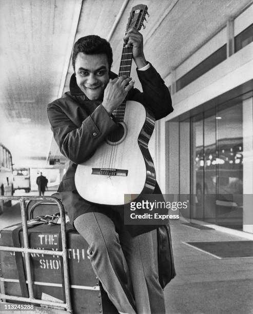 American singer Johnny Mathis at the airport for his holiday in Gstaad, Switzerland in February 1969.