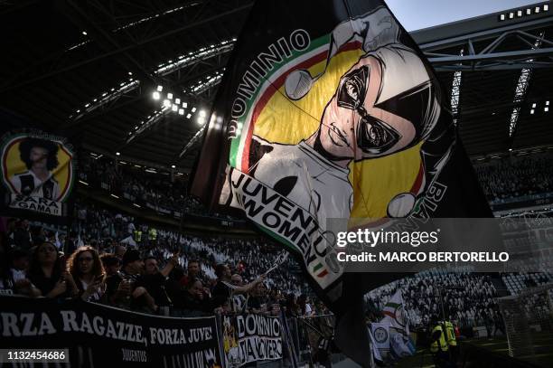 Juventus fans display a giant tifo prior to the Women's Serie A football match Juventus vs Fiorentina on March 24, 2019 at the Juventus stadium in...