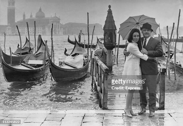 British actress Claire Bloom and her husband American actor Rod Steiger in Venice, Italy for the film festival in September 1963.