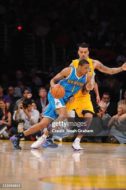 Trevor Ariza of the New Orleans Hornets moves the ball against the Los Angeles Lakers during Game Two of the Western Conference Quarterfinals in the...