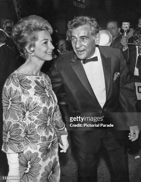 American composer and conductor Leonard Bernstein and his wife actress Felicia Montealegre at the New York film premiere of 'Cleopatra' on June 12,...