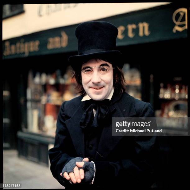 Drummer Keith Moon , of English rock group The Who, dressed as Scrooge for Disc and Music Echo magazine Christmas edition, London, 14th December...