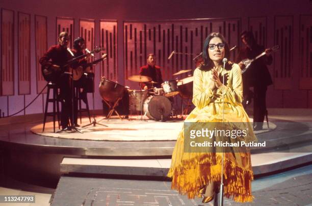 Nana Mouskouri performs on a TV show circa 1970.