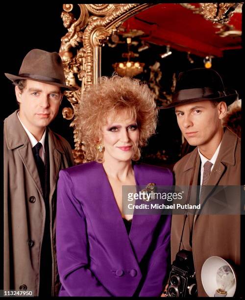 Dusty Springfield with the Pet Shop Boys, dressed as 1960s journalists, studio portrait, shooting cover for 'Nothing Has Been Proved' single, London,...