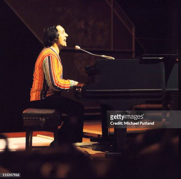 Neil Sedaka performs on a TV show, London, 1974.