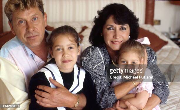 Record producer and songwriter Mickie Most, at home with his wife Christina and children Nathalie and Cristalle in Totteridge, London, circa 1988.