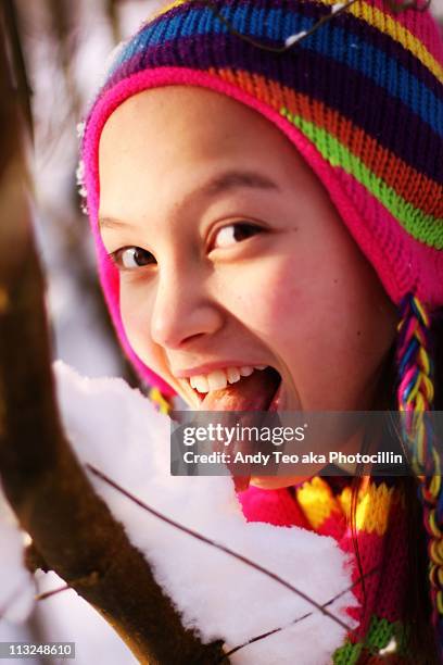 never eat yellow snow. - girls licking girls stock pictures, royalty-free photos & images