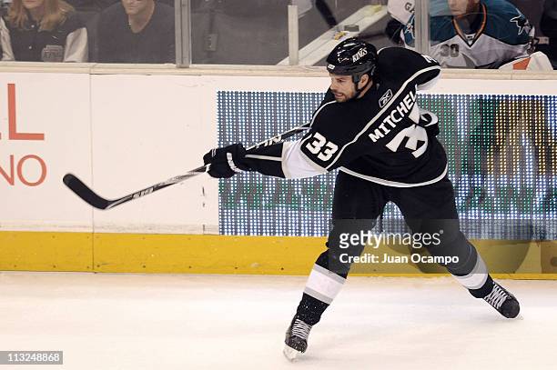 Willie Mitchell of the Los Angeles Kings shoots the puck against the San Jose Sharks in Game Four of the Western Conference Quarterfinals during the...
