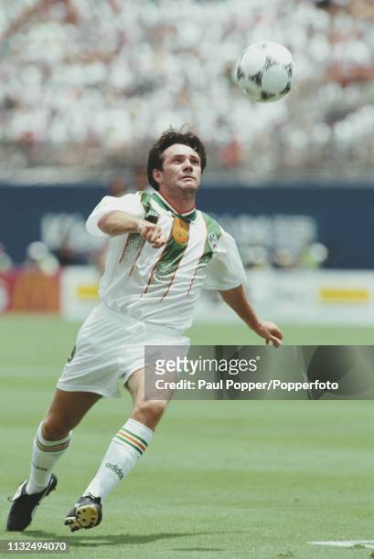 Ray Houghton of Republic of Ireland takes possession of the ball during play between Mexico and Republic of Ireland in the 1994 FIFA World Cup Group...