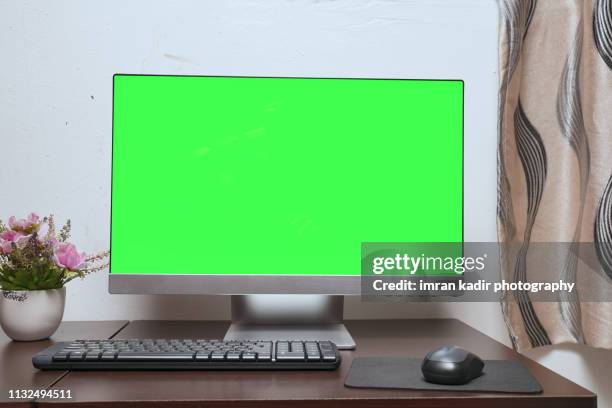 green screen desktop on study desk - computer monitor green screen stock pictures, royalty-free photos & images