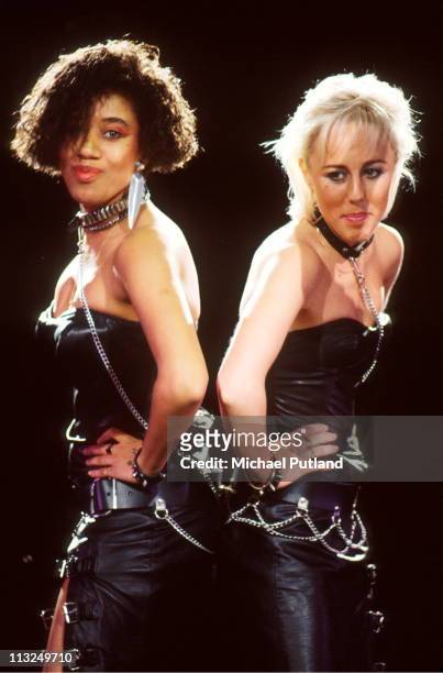 Pepsi and Shirlie, Wham! backing singers, perform on stage, Japan L-R Helen DeMacque, Shirlie Holliman.