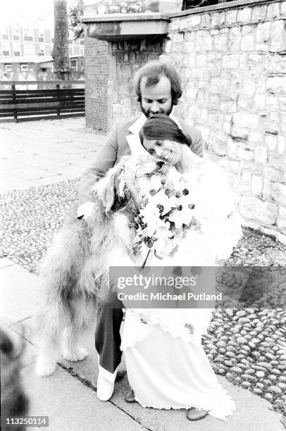 John Peel and wife Sheila Gilhooly with their dog Woggle at their wedding, Regents Park, London, 31st August 1974.