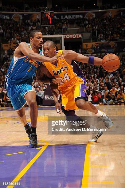 Kobe Bryant of the Los Angeles Lakers moves the ball against the New Orleans Hornets during Game Two of the Western Conference Quarterfinals in the...