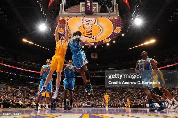 Pau Gasol of the Los Angeles Lakers lays up the ball against the New Orleans Hornets during Game Two of the Western Conference Quarterfinals in the...