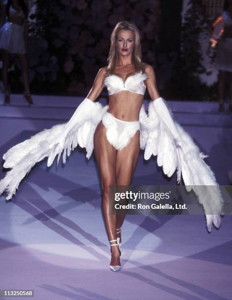 Model Karen Mulder walks the runway at the Fourth Annual Victoria's Secret Fashion Show - Runway on February 3, 1998 at The Plaza Hotel in New York...