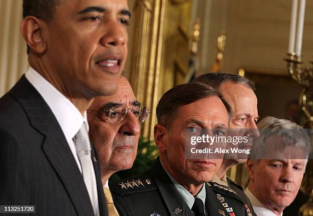 President Barack Obama speaks as Leon Panetta, Army General David Petraeus, Marine General John Allen, and Ambassador Ryan Crocker, listen during an...