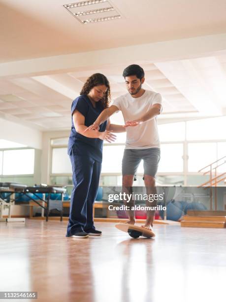 Standing Balance 842 Standing Balance Therapy Stock Photos, High-Res Pictures, and ...