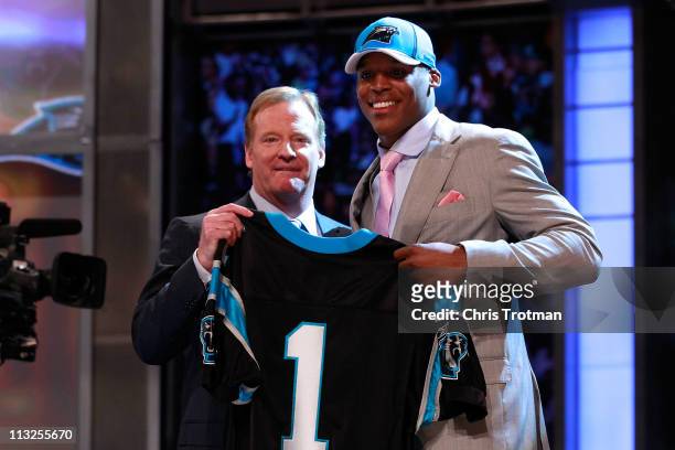 COmmissioner Roger Goodell poses for a photo with Carolina Panthers overall pick Cam Newton from the UNiversity of Auburn during the 2011 NFL Draft...
