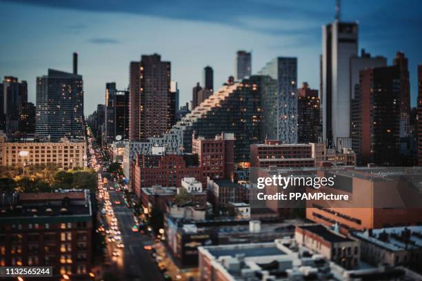 uptown manhattan sunset cityscape - tilt shift stock pictures, royalty-free photos & images