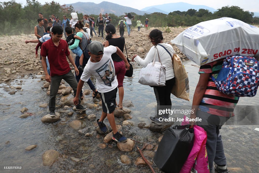 Colombian Border Towns See Influx Of Venezuelans Crossing Amid Country's Political Turmoil