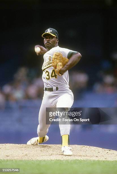 Pitcher Dave Stewart of the Oakland Athletics pitches against the New York Yankees during a Major League Baseball game circa 1990 at Yankee Stadium...