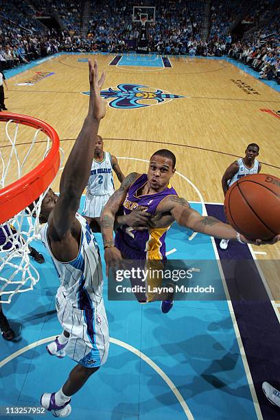 Shannon Brown of the Los Angeles Lakers shoots against Emeka Okafor of the New Orleans Hornets in Game Six of the Western Conference Quarterfinals in...