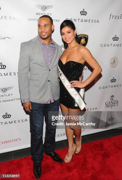 Player Bret Lockett, defensive end for the New England Patriots and Miss USA Rima Fakih attend the Cantamessa Jewels U.S. Launch at Manhattan...