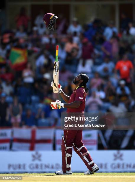 Chris Gayle of the West Indies celebrates reaching his century during the 4th One Day International match between the West Indies and England at...