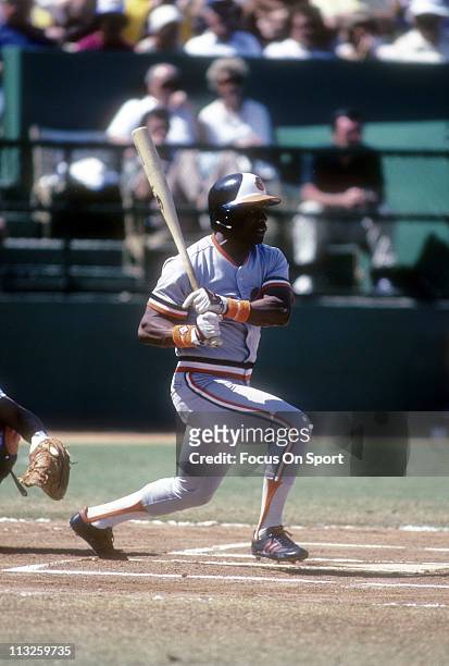 Al Bumbry of the Baltimore Orioles swings and watches the flight of his ball during a Major League Baseball game circa 1975. Bumbry played for the...