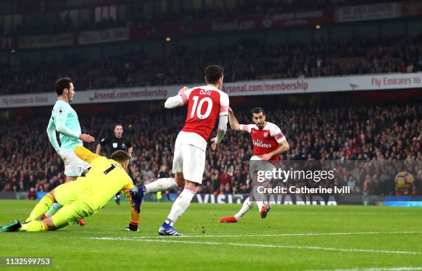 Henrikh Mkhitaryan of Arsenal scores his team's second goal during the Premier League match between Arsenal FC and AFC Bournemouth at Emirates...