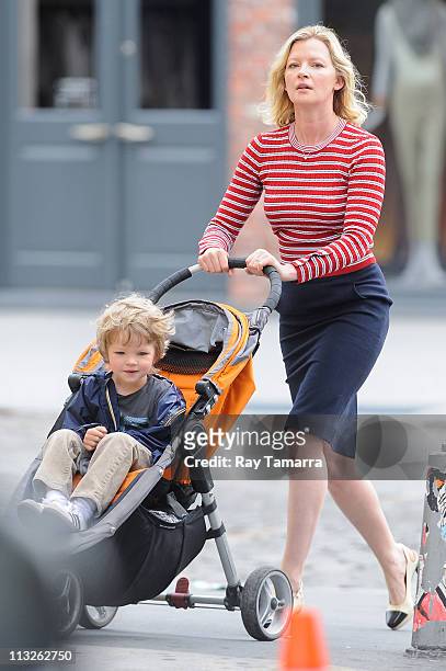 Actress Gretchen Mol walks her son Ptolemy John Williams in the Meatpacking District on April 28, 2011 in New York City.