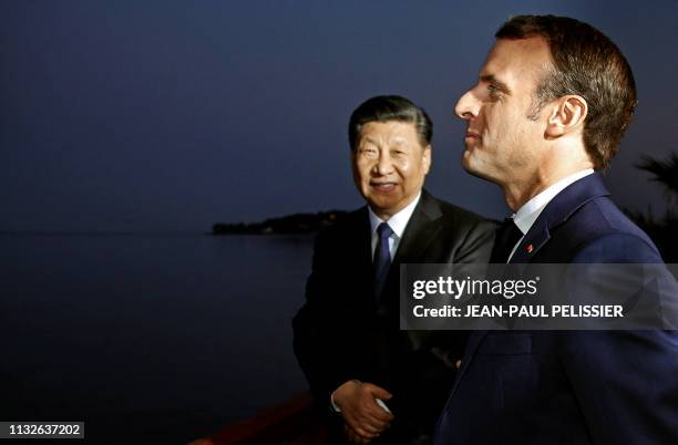 French President Emmanuel Macron and China's President Xi Jinping pose as they visit the Villa Kerylos before a dinner on March 24, 2019 in...