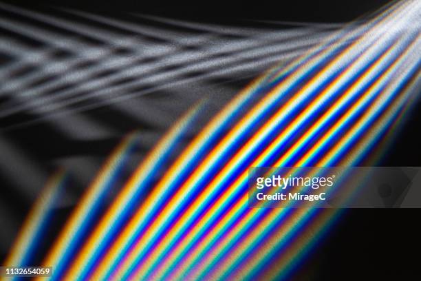 striped light beams emitting - kreuzmuster stock-fotos und bilder