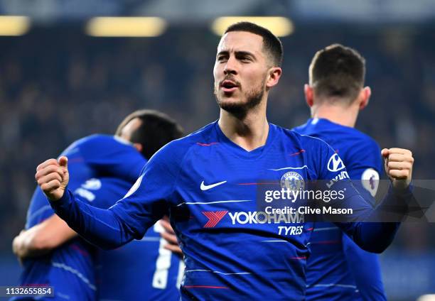 Eden Hazard of Chelsea celebrates as Pedro of Chelsea scores their first goal during the Premier League match between Chelsea FC and Tottenham...