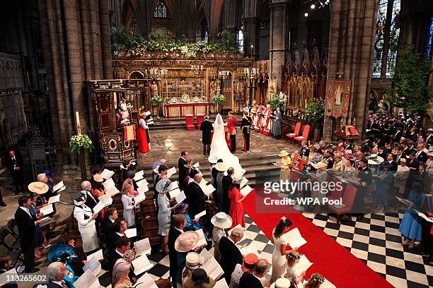 Prince William stands deside his bride Catherine Middleton with her father Michael Middleton on April 29, 2011 in London, England. The marriage of...