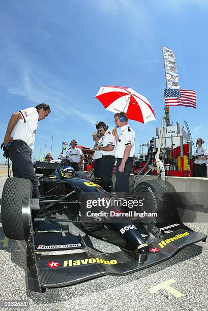 With race victory and pole position pennants flying Cristiano da Matta waits to enter the track during practice for the Marconi Grand Prix of...