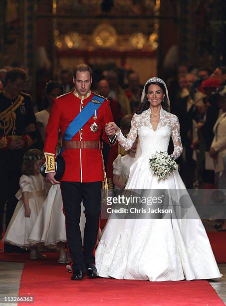 Prince William, Duke of Cambridge and Catherine, Duchess of Cambridge smile following their marriage at Westminster Abbey on April 29, 2011 in...