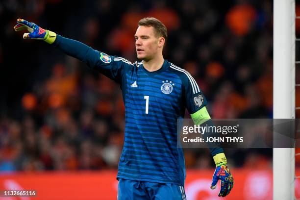 Germany's goalkeeper Manuel Neuer gestures during the UEFA Euro 2020 Group C qualification football match between The Netherlands and Germany at the...